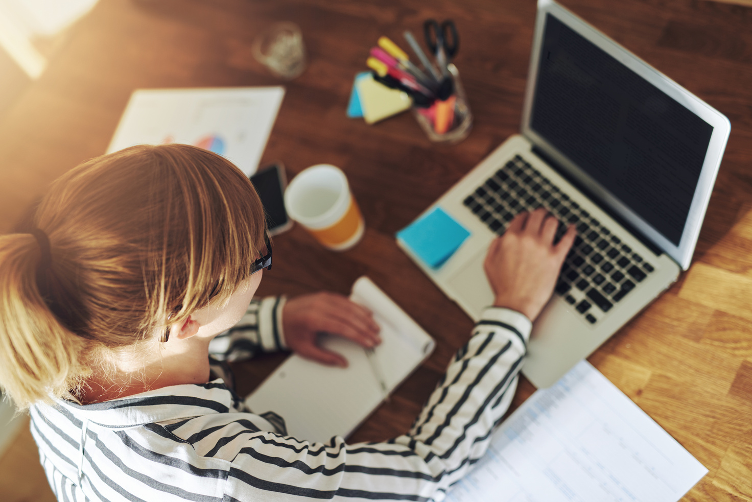 Young Female Entrepreneur Working in a Home Office